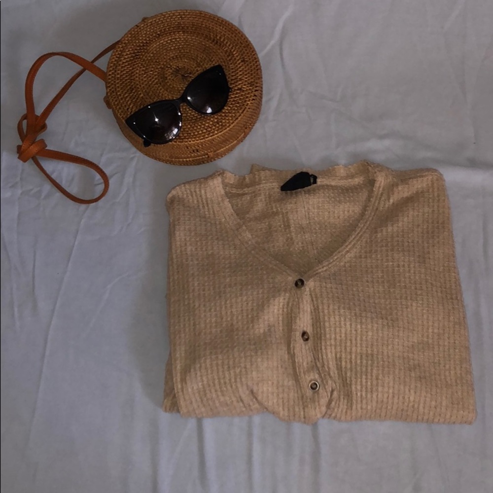 Waffle-knit tan button-up sweater